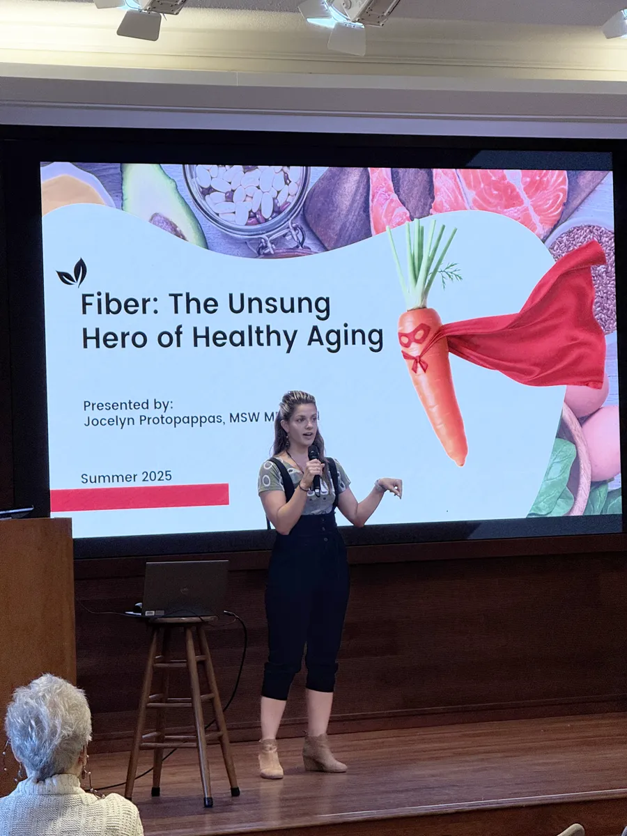 Jocelyn Protopappas presenting “Fiber: The Unsung Hero of Healthy Aging” to an audience